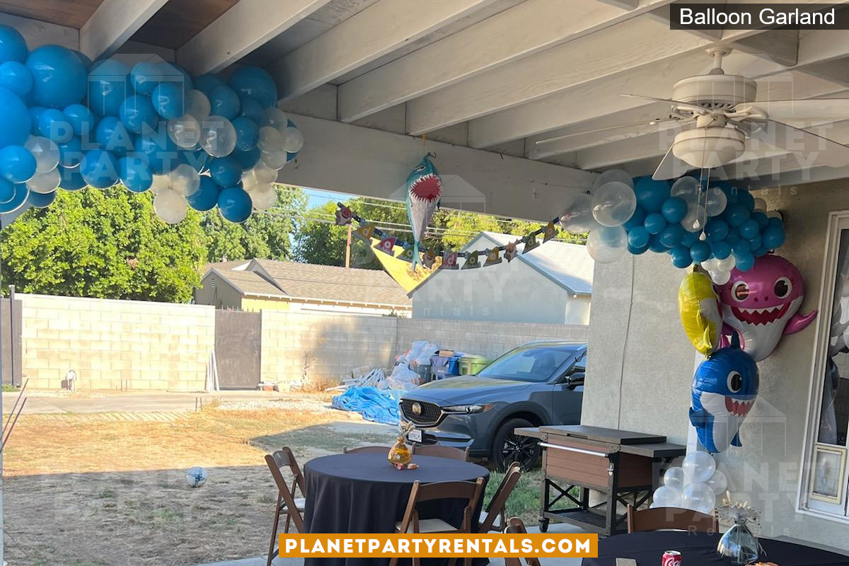 Balloon decoration hanging from patio awning