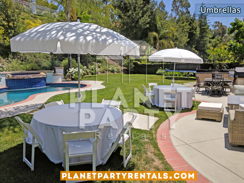 White Umbrella with 60" Round Tables and White Tablecloth and White Plastic Chairs